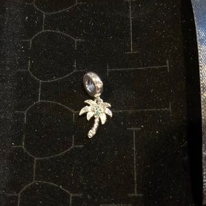 Pandora palm tree charm.